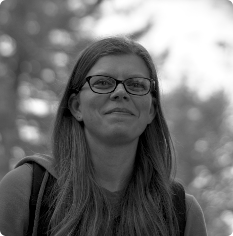 Professional portrait of Heather Flores, UI/UX Designer and Front-End Developer.